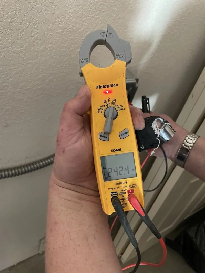 Voltage testing with clamp meter during Circuit Breaker Repair in Portland